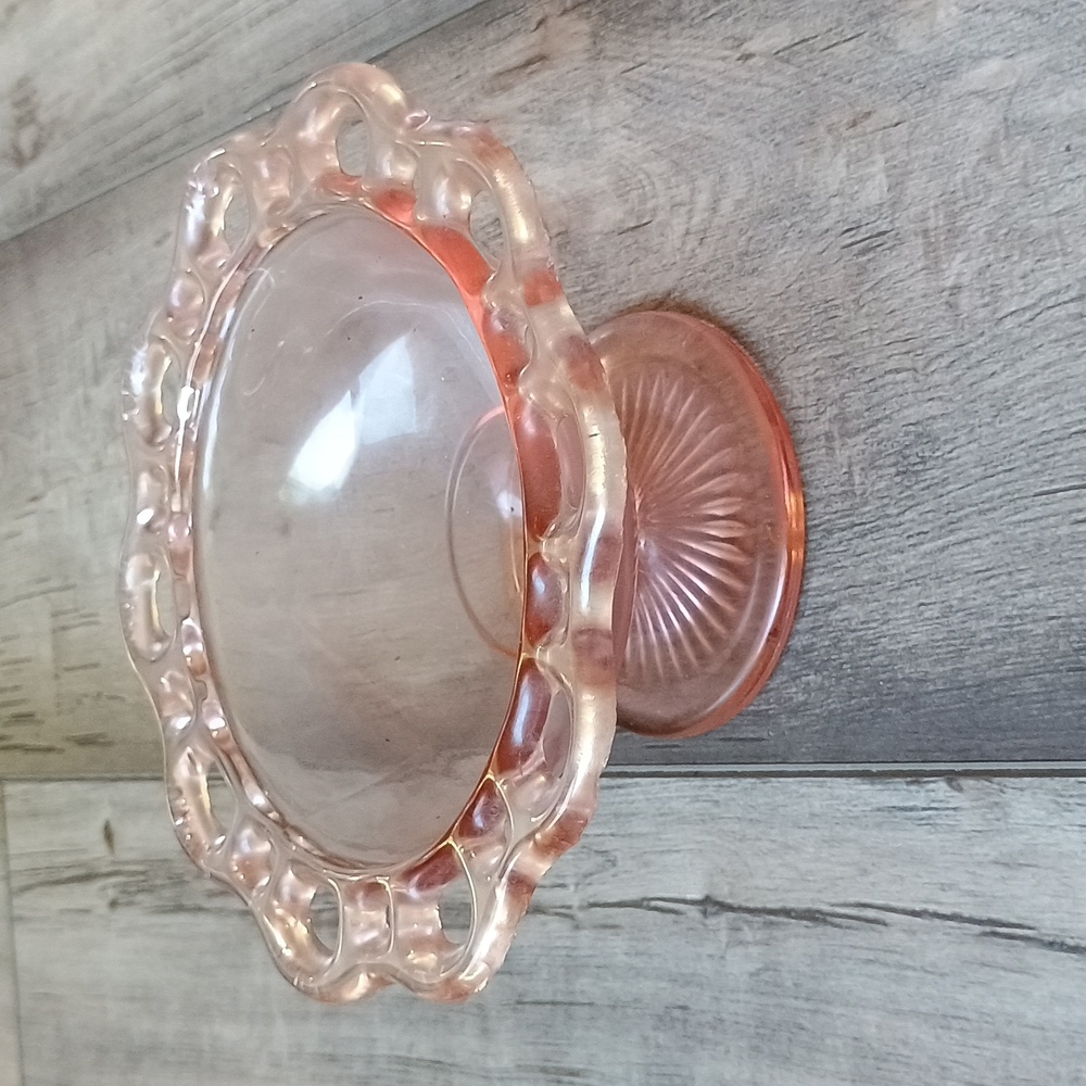 Pink depression glass bowl On Pedestal With scalloped edge